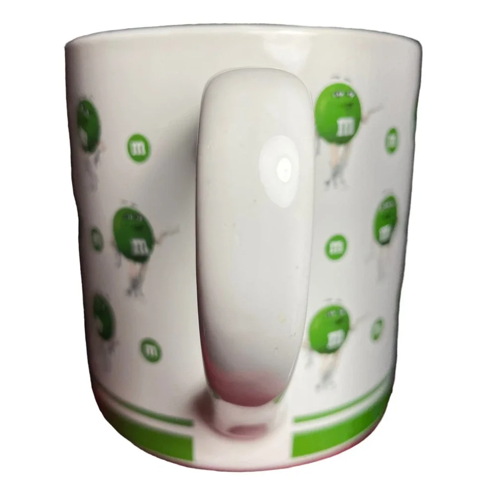 M&M Dancing Green M&M White Boots Mars Mug 2018 Frankford Candy 16 oz‎